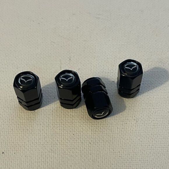 Mazda valve Stem caps in Black set of 4 NWT - Picture 3 of 4